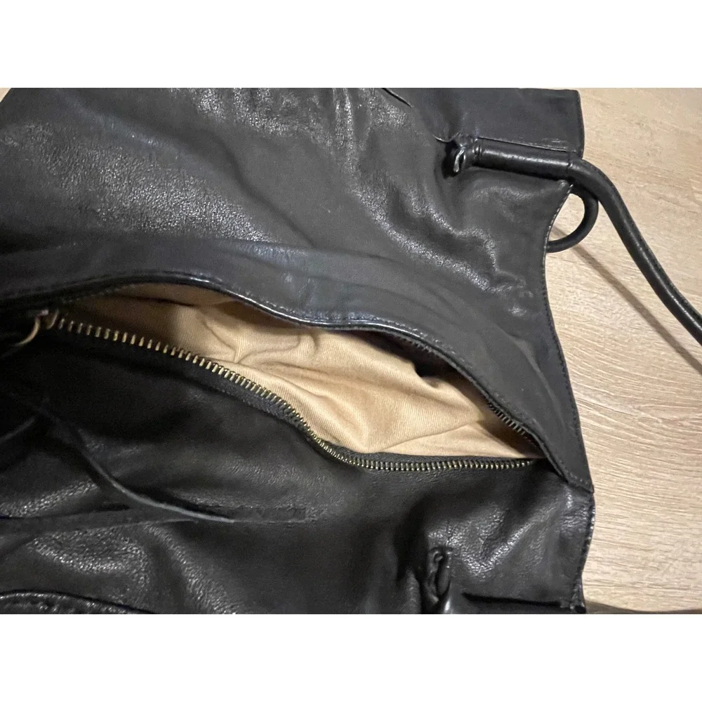Hobo Black Top Grain Leather Tassel Tote Bag Rolled Straps and Exterior Pocket